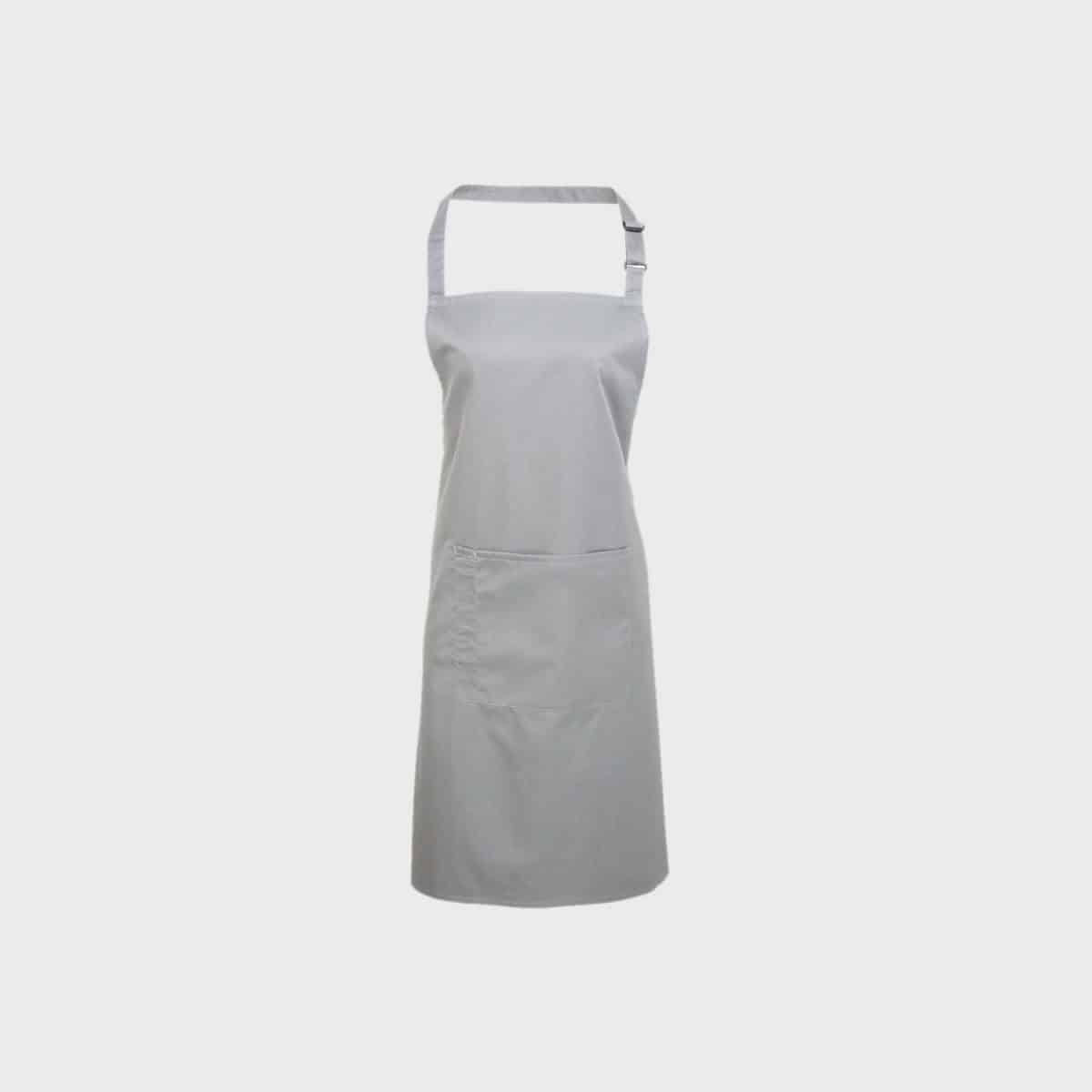 Eine PREMIER WORKWEAR Latzschürze mit Tasche in Grau, mit verstellbarem Nackenband und großer Fronttasche, präsentiert vor einem schlichten weißen Hintergrund. Diese Schürze besticht durch ihr einfaches und sauberes Design, ideal für PREMIER WORKWEAR.