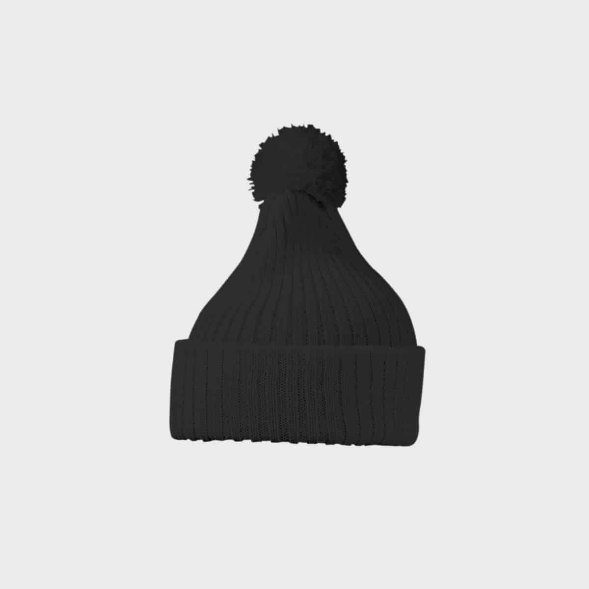Die MYRTLE BEACH Strickmütze mit Bommel ist eine schwarze Strickmütze mit gefalteter Krempe und einem Bommel oben. Sie hat eine gerippte Textur und hebt sich von einem schlichten hellgrauen Hintergrund ab.