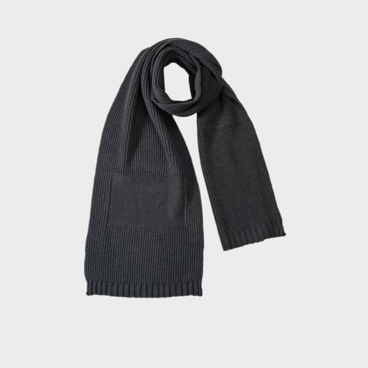 The promotional scarf is a neatly folded dark gray knit accessory with a textured pattern and ribbed edges, ideal for any promotional event. The scarf is presented flat against a light gray background.
