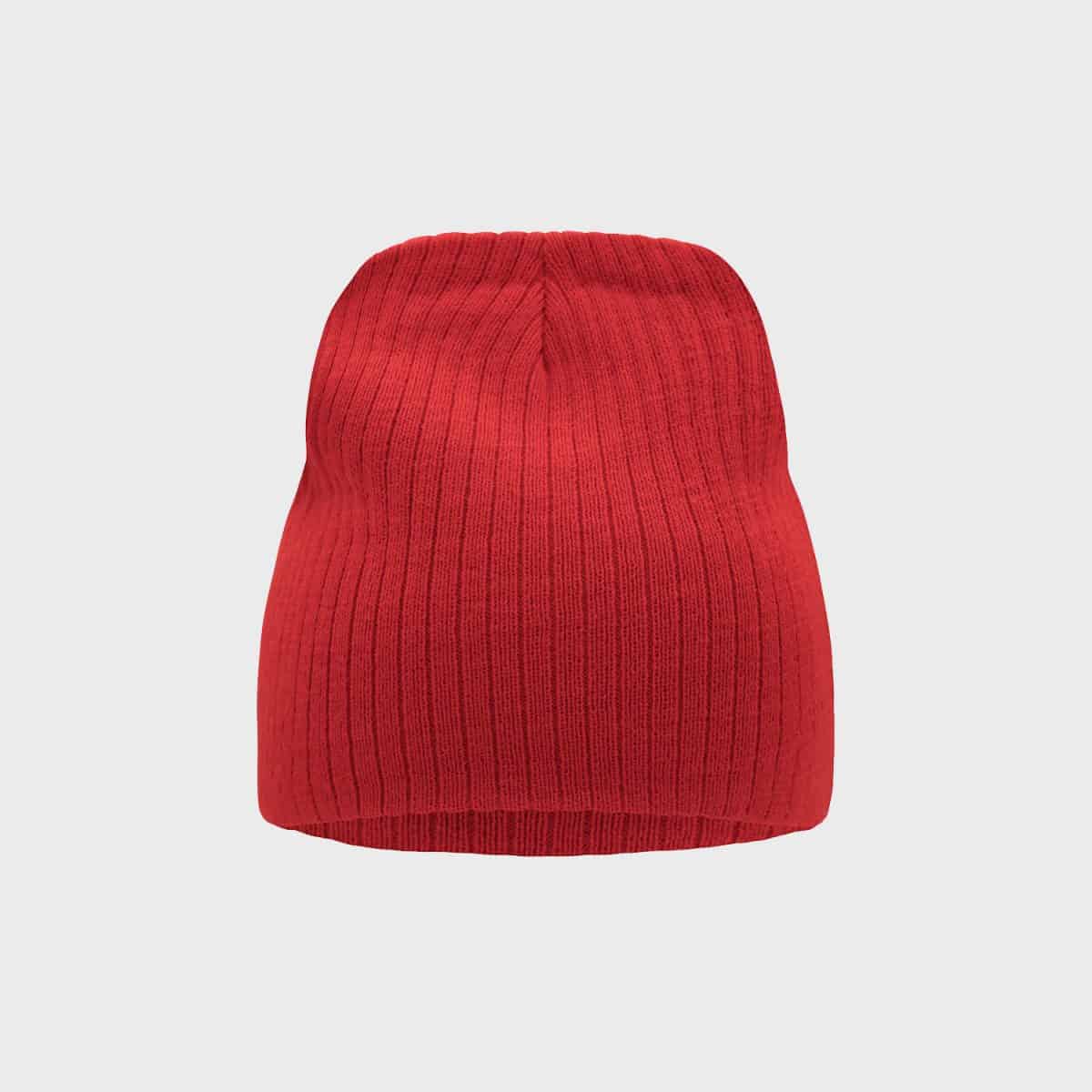 A bright red rib knit Beanie hat is centered against a plain light grey background. The Beanie has a rounded top and a comfortable fit that covers the head and ears and is perfect for cold weather.