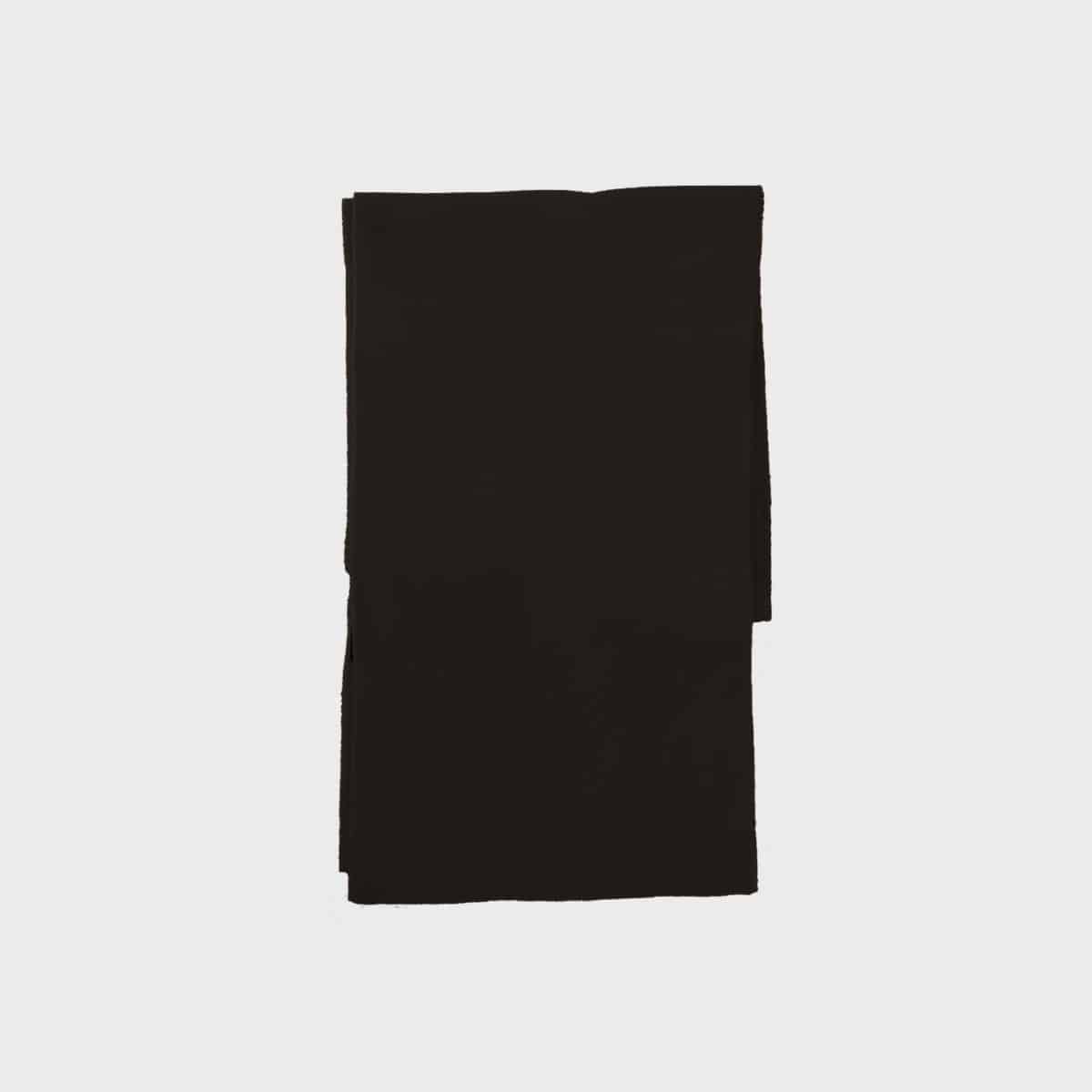 A neatly folded black scarf against a plain white background. The scarf appears soft and smooth with clean lines, emphasizing its simplicity and elegance.